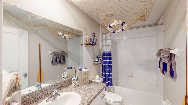 full bathroom with shower / bathtub combination with curtain, vanity, and toilet