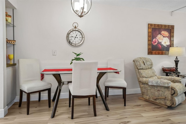 dining space featuring light hardwood / wood-style flooring