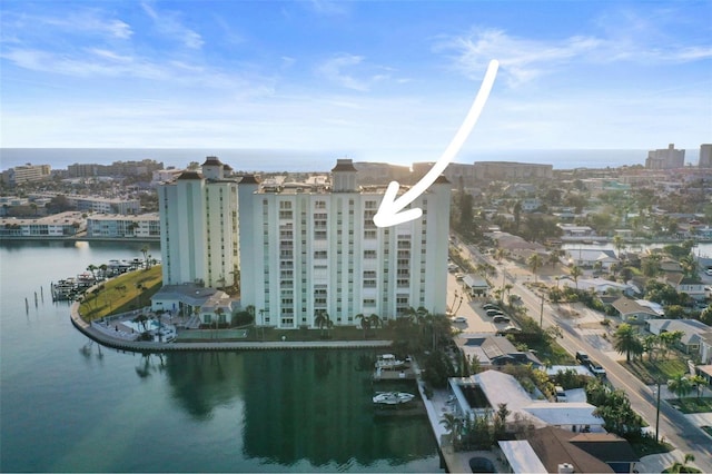 birds eye view of property featuring a water view