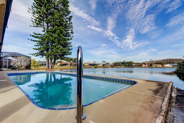 view of swimming pool with a water view