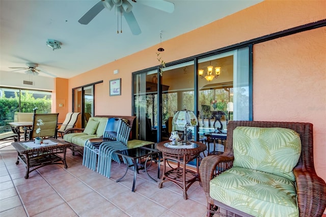 view of patio / terrace with visible vents, an outdoor hangout area, and a ceiling fan