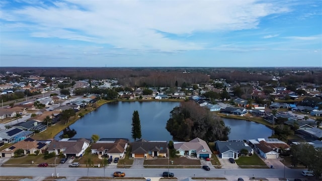 aerial view featuring a residential view and a water view