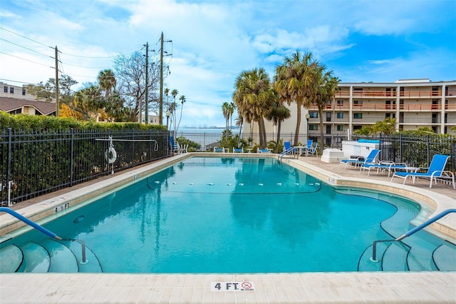 view of pool featuring a patio area