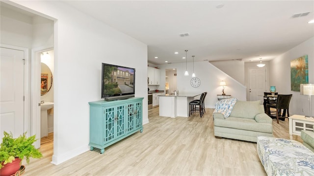 living room featuring light hardwood / wood-style floors