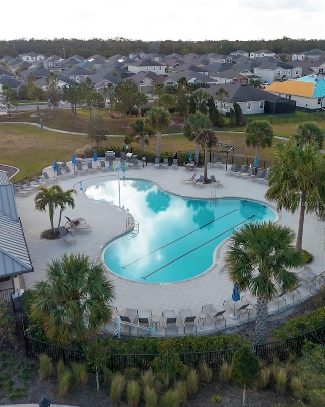 view of swimming pool featuring a patio area