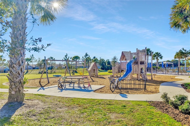 view of play area with a yard