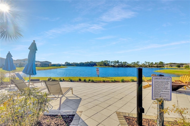 view of patio featuring a water view