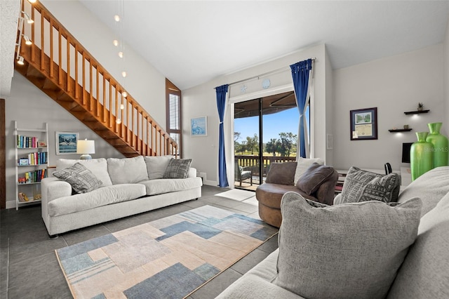 living room featuring a towering ceiling