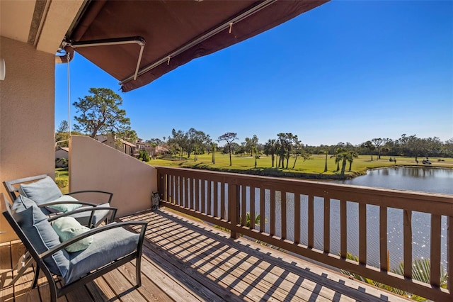 deck featuring a water view