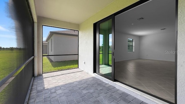 view of unfurnished sunroom