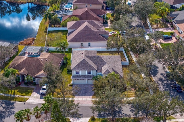 drone / aerial view with a water view