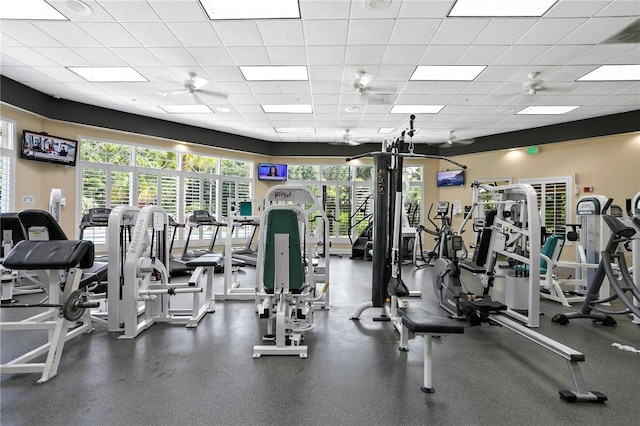 gym featuring a paneled ceiling