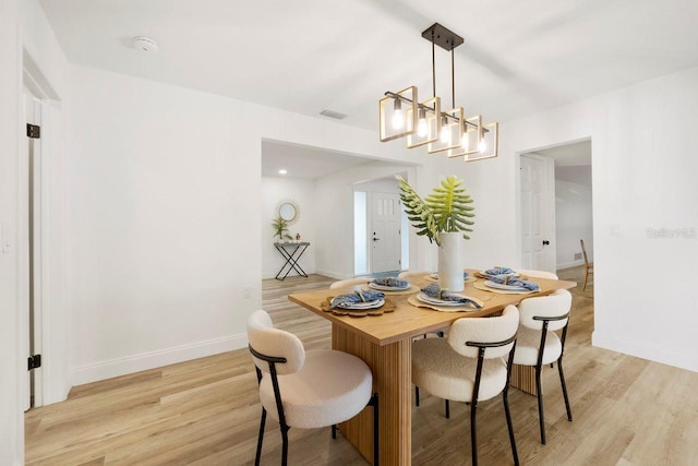 dining room featuring light wood-type flooring