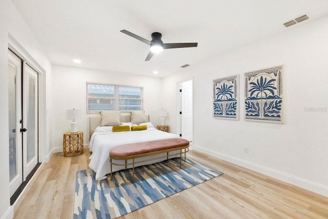 bedroom with ceiling fan and light wood-type flooring