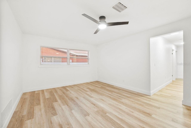 spare room with ceiling fan and light hardwood / wood-style flooring