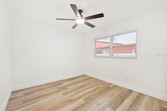 unfurnished room featuring ceiling fan and light hardwood / wood-style floors