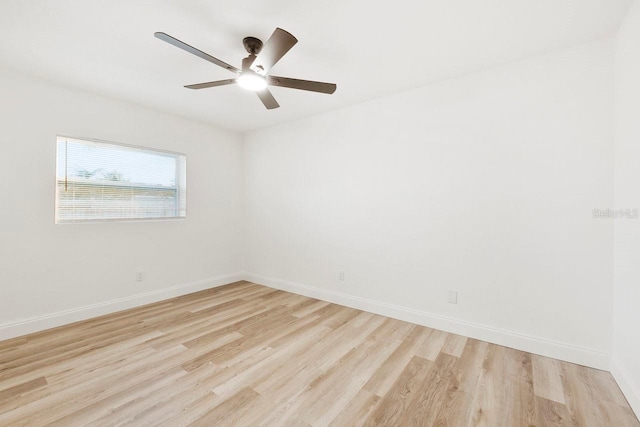 unfurnished room featuring light hardwood / wood-style floors and ceiling fan