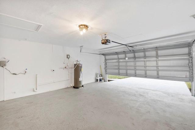 garage with a garage door opener and water heater