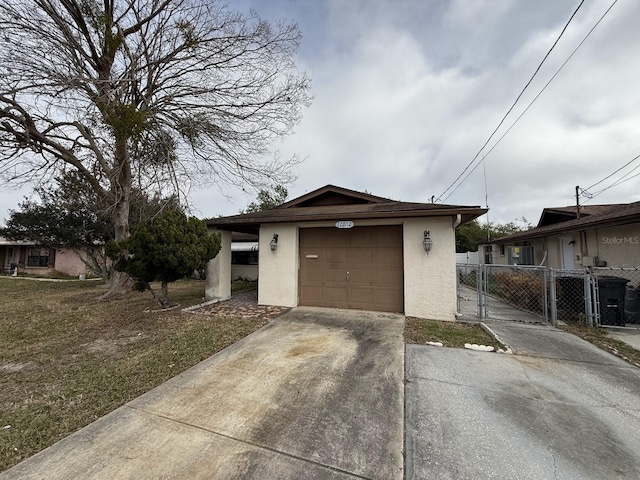 view of front facade featuring a garage and an outdoor structure