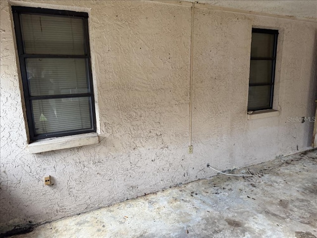 exterior details with stucco siding