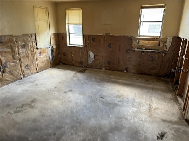 spare room with plenty of natural light