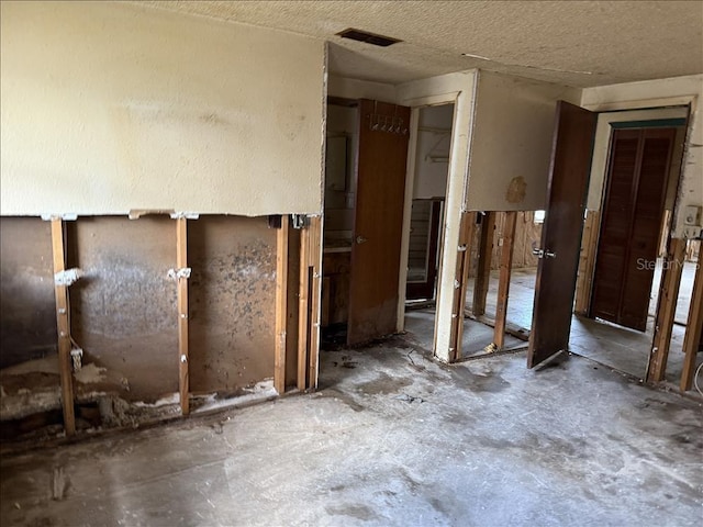 misc room with visible vents