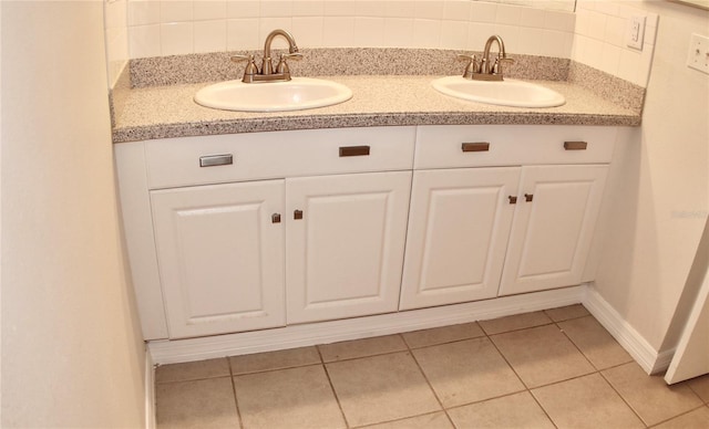 bathroom with tile patterned flooring and vanity