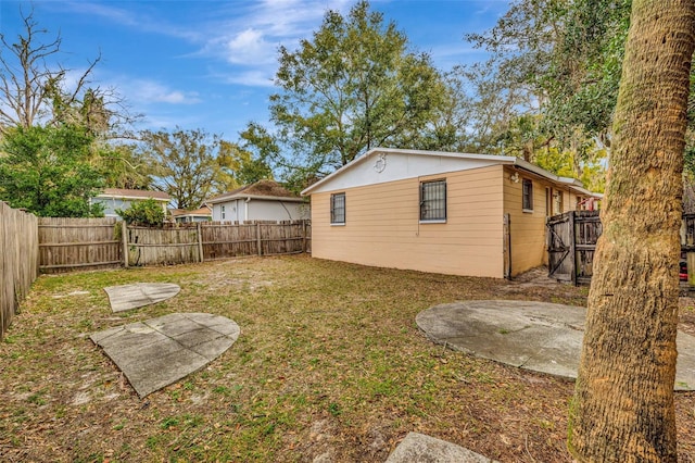 exterior space featuring a yard and a patio area