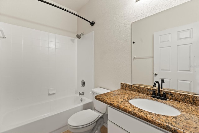 full bathroom with vanity,  shower combination, and toilet