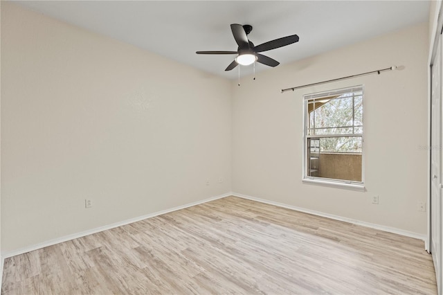 unfurnished room featuring ceiling fan and light hardwood / wood-style floors