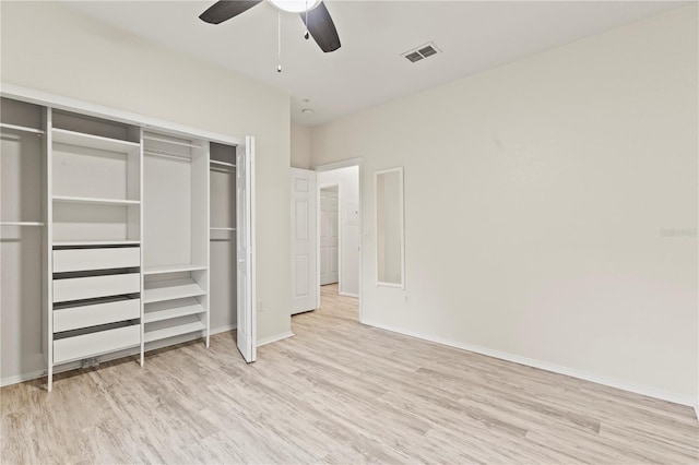 unfurnished bedroom with a closet, ceiling fan, and light hardwood / wood-style flooring