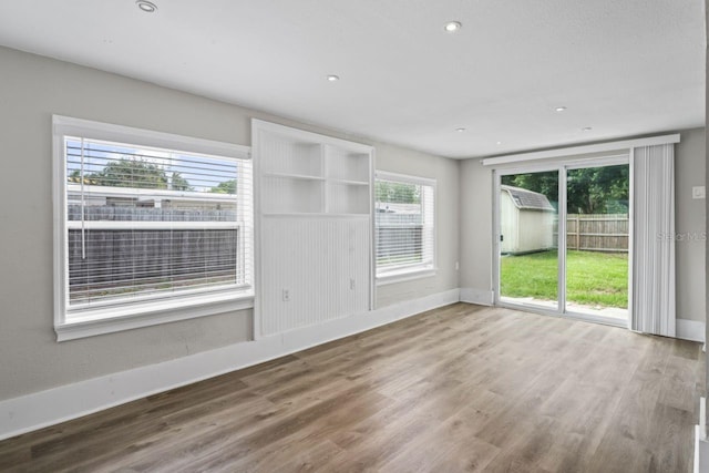 interior space with hardwood / wood-style floors