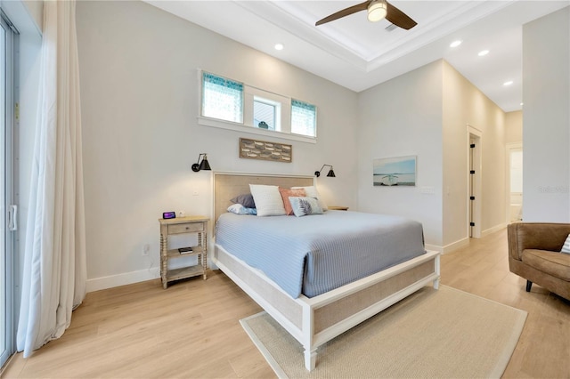 bedroom with ceiling fan and light wood-type flooring