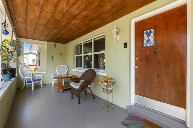 doorway to property featuring a porch