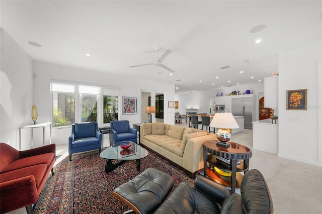 living room featuring ceiling fan