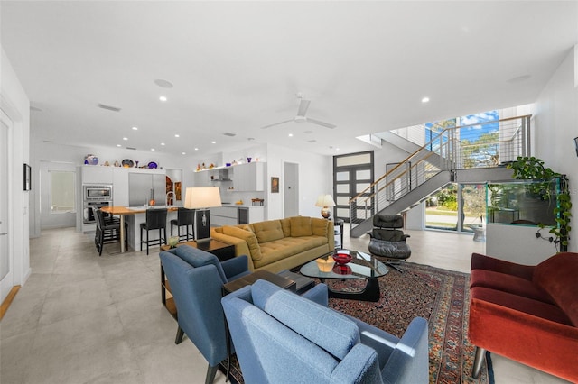 living room with ceiling fan