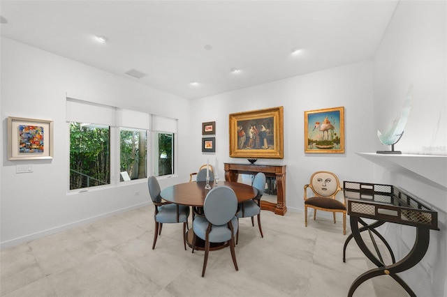 dining room with recessed lighting, visible vents, and baseboards