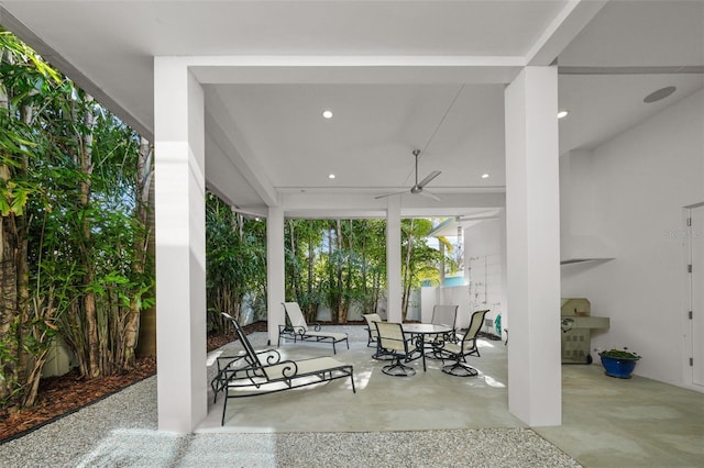 view of patio featuring ceiling fan