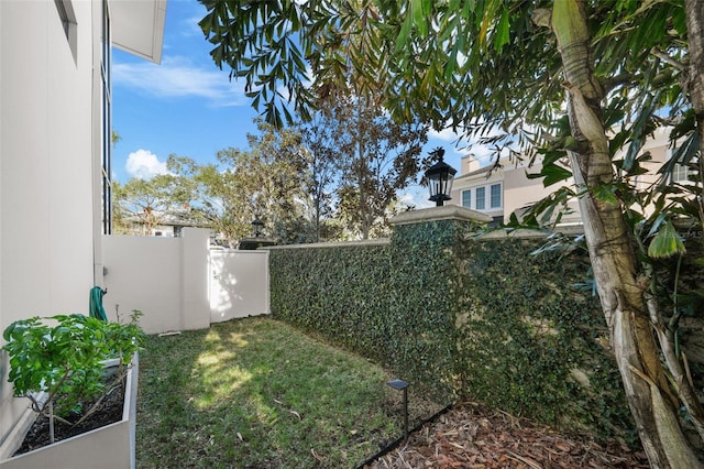 view of yard with fence