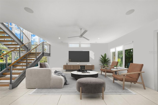 living room with light tile patterned floors, stairway, a ceiling fan, and recessed lighting