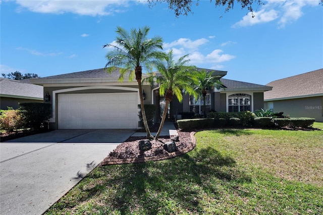 ranch-style home featuring a front lawn and a garage