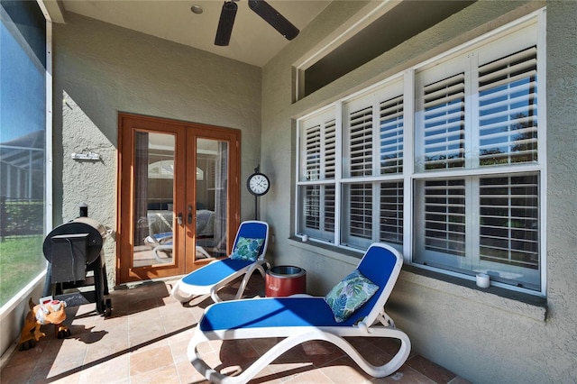 exterior space with french doors and ceiling fan