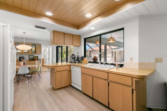 kitchen with decorative light fixtures, sink, wood ceiling, kitchen peninsula, and white appliances