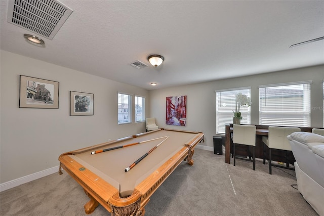 game room with carpet, visible vents, and baseboards