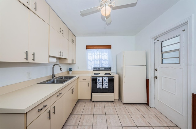 kitchen featuring ceiling fan, white appliances, sink, and light tile patterned floors