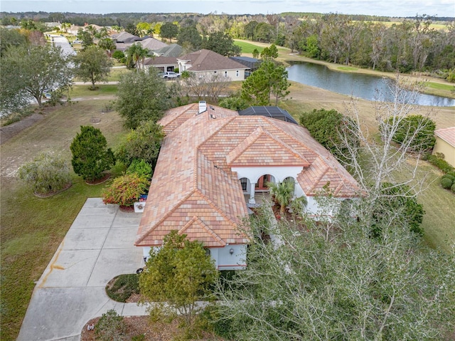 drone / aerial view with a water view