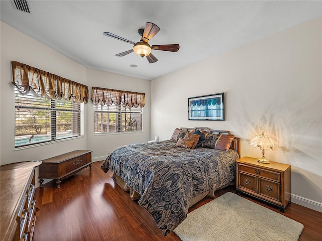 bedroom featuring dark hardwood / wood-style floors and ceiling fan