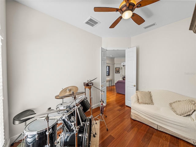 interior space featuring hardwood / wood-style flooring and ceiling fan