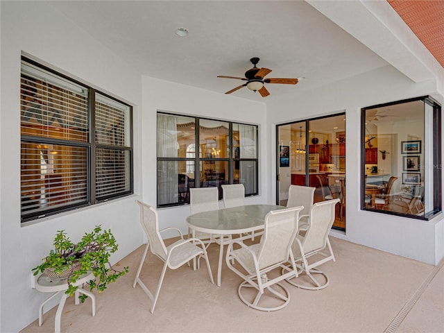 view of patio featuring ceiling fan