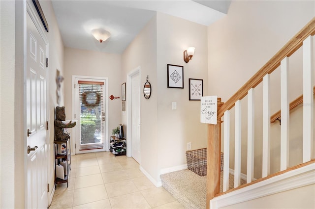 view of tiled foyer entrance